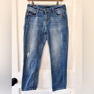 Supplies brand straight leg ankle/cropped jean with light distressing. Size 6